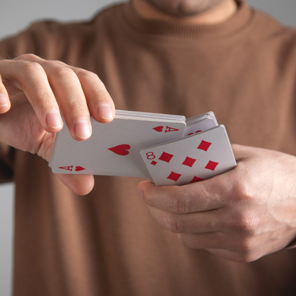 Man showing playing cards Hobby